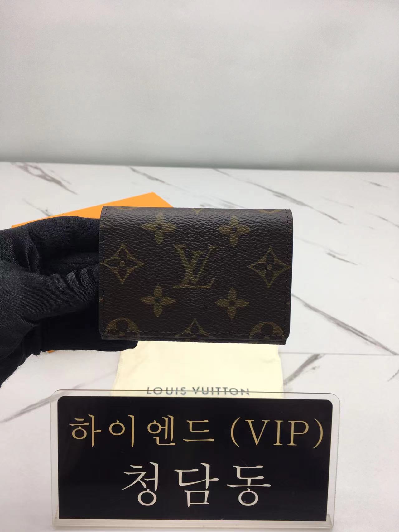 루이비통 엔벨로프 카르트 드 비지트 M63801