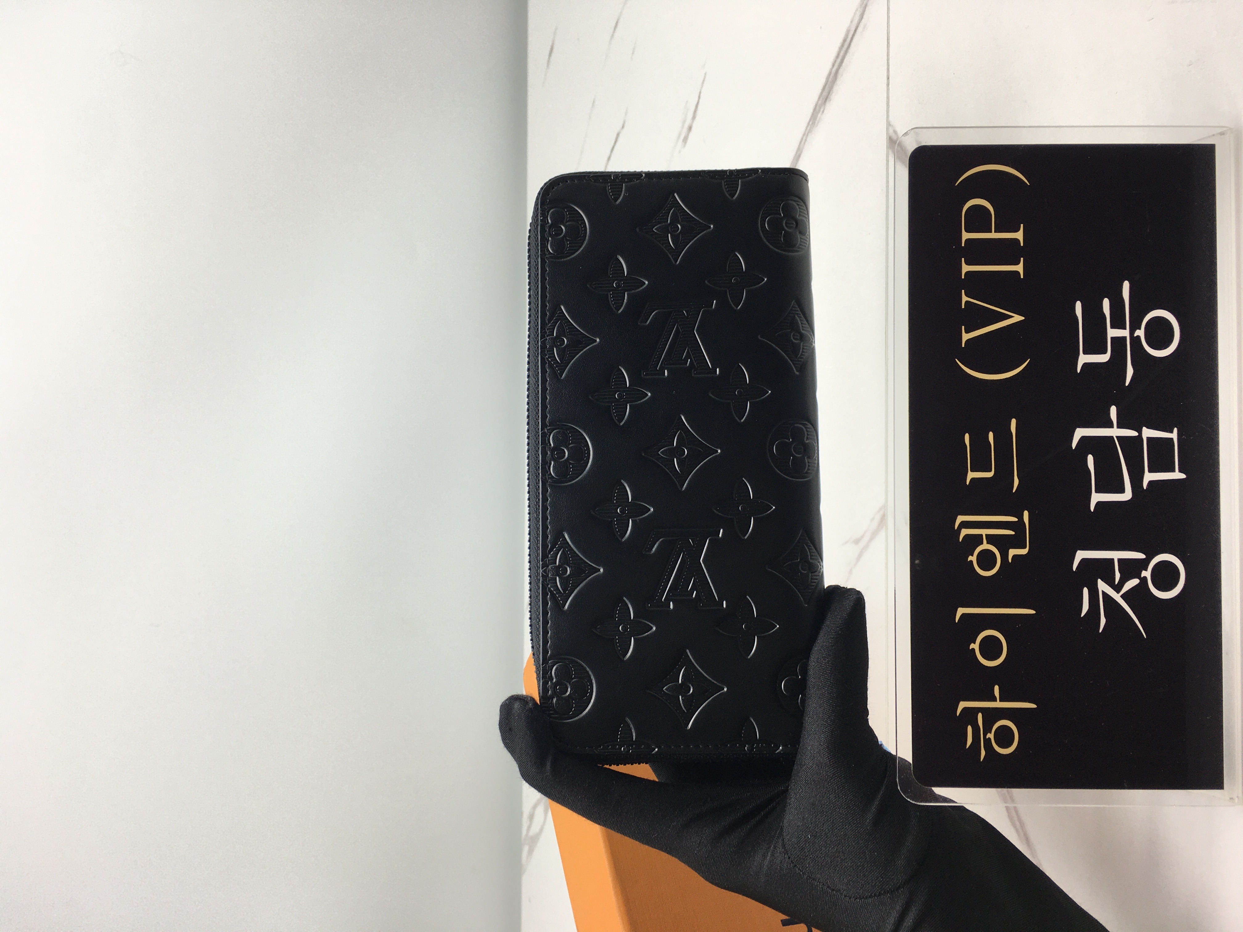 루이비통 모노그램 지피 버티컬 월릿 M62902