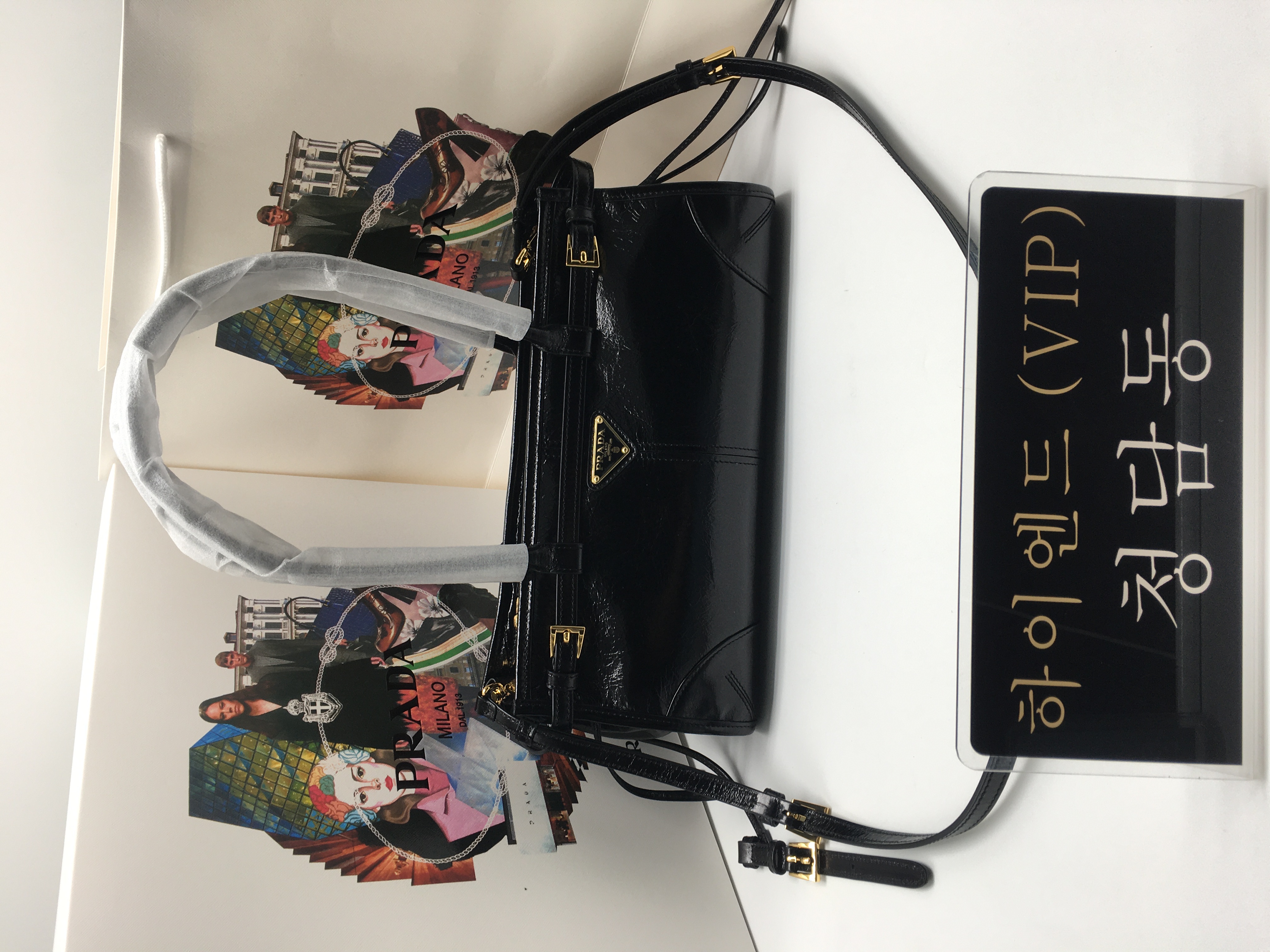 프라다 미디엄 나플락 페이던트 가죽 핸드백 1BA426