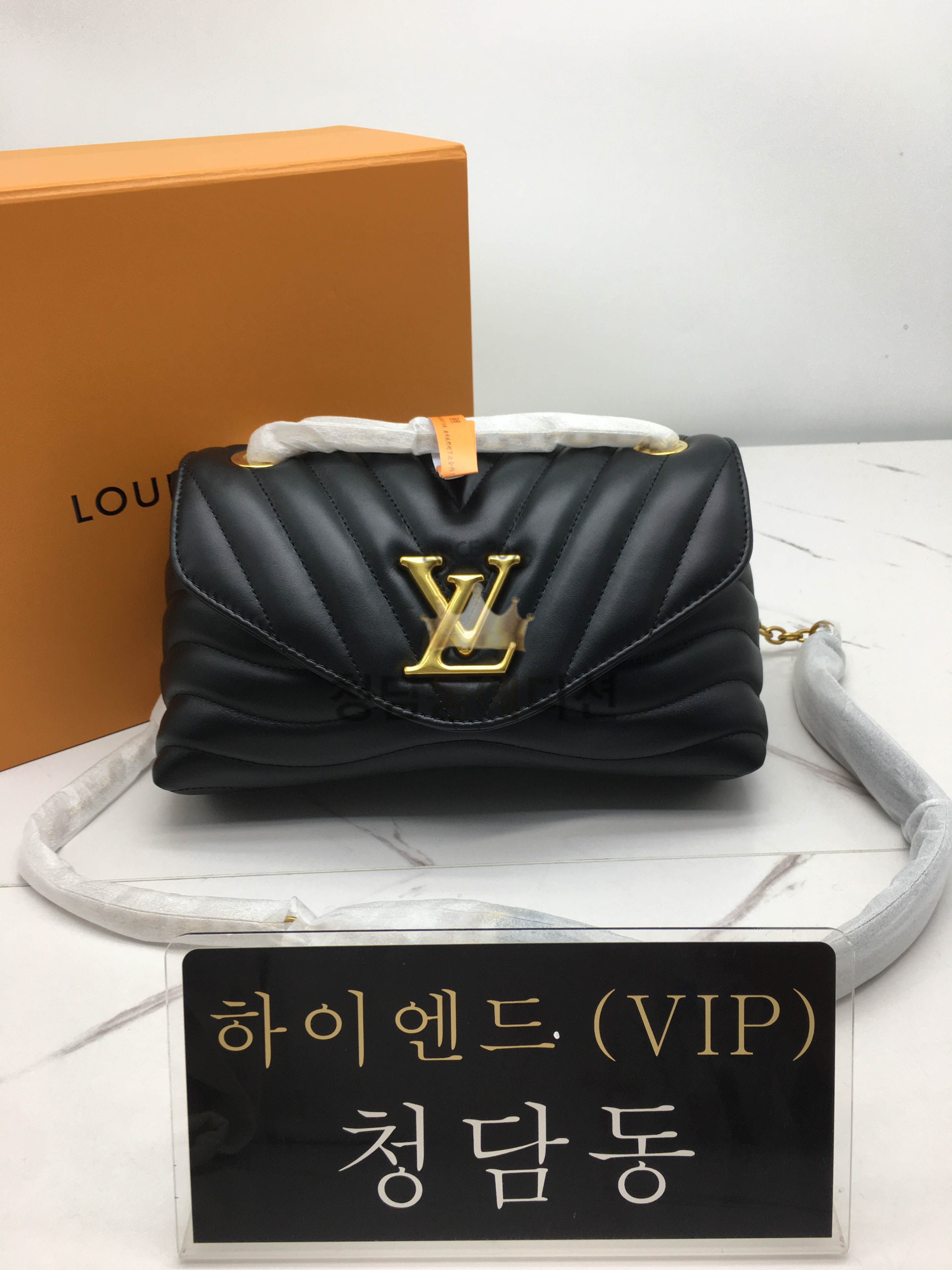 루이비통 뉴 웨이브 체인백 블랙 M58552