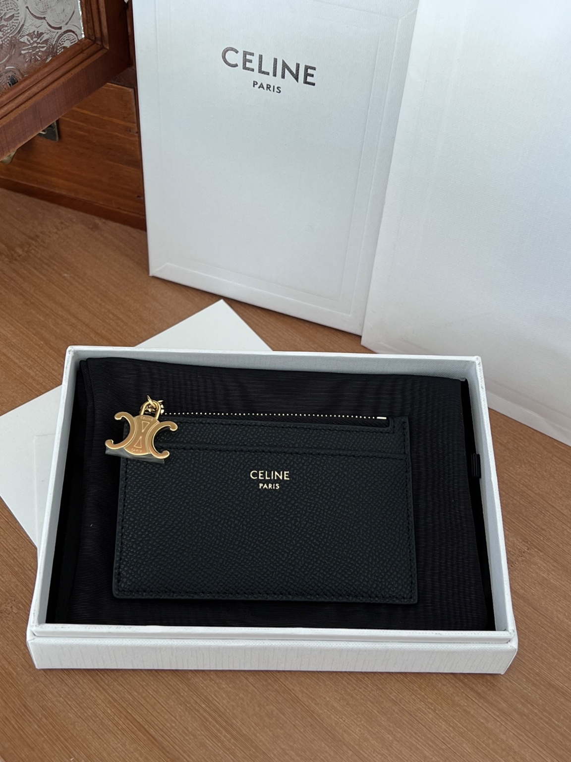 셀린느 트리옹프 참 지퍼 카드 지갑 그레인 카프스린